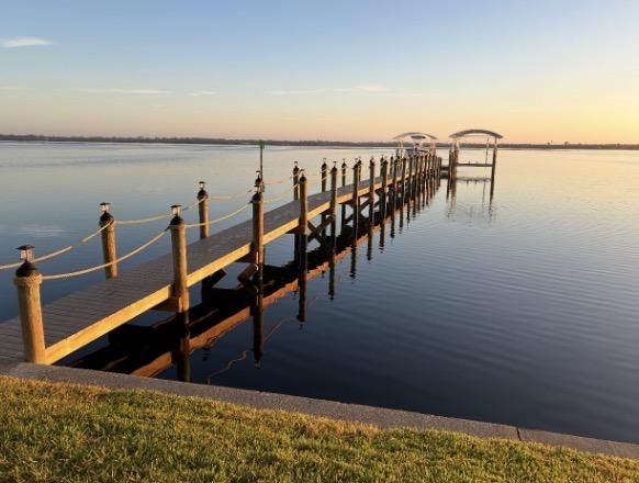 Rope-railed dock at golden hour