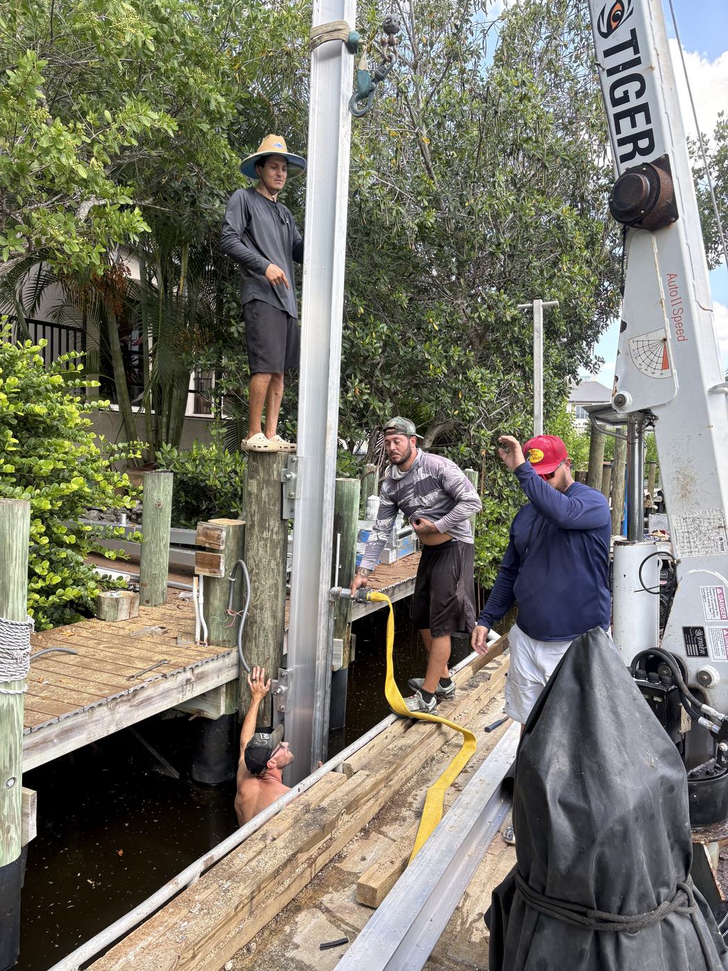 Setting elevator lift rails from the barge