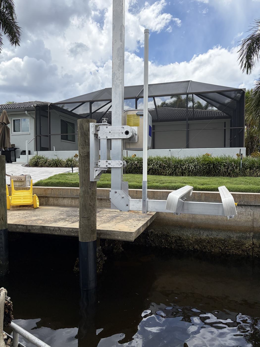 A PWC lift installed at a canal seawall