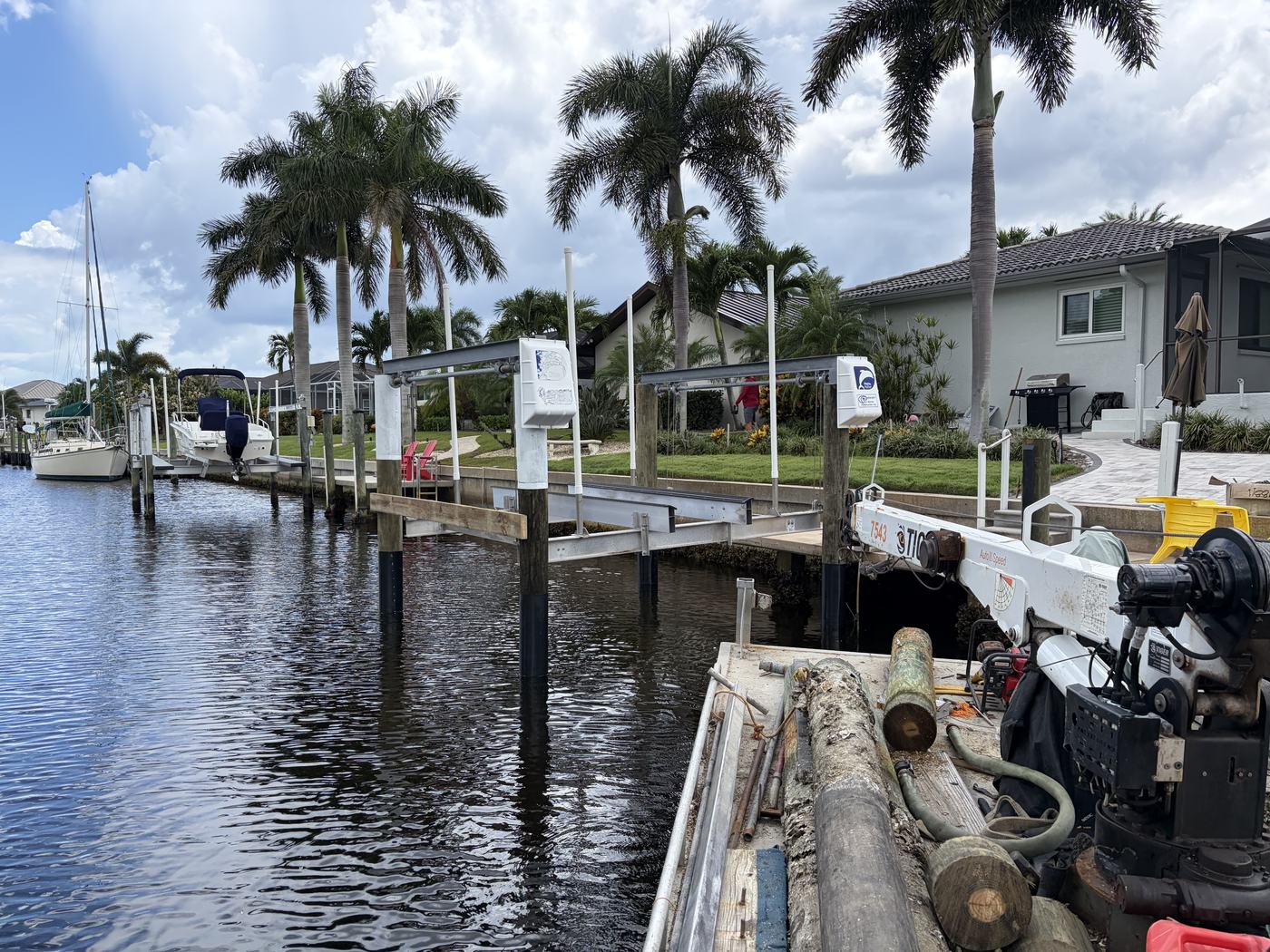 Old pilings hauled off on the barge