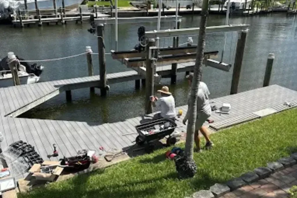 Dock and boat lift construction project on residential canal